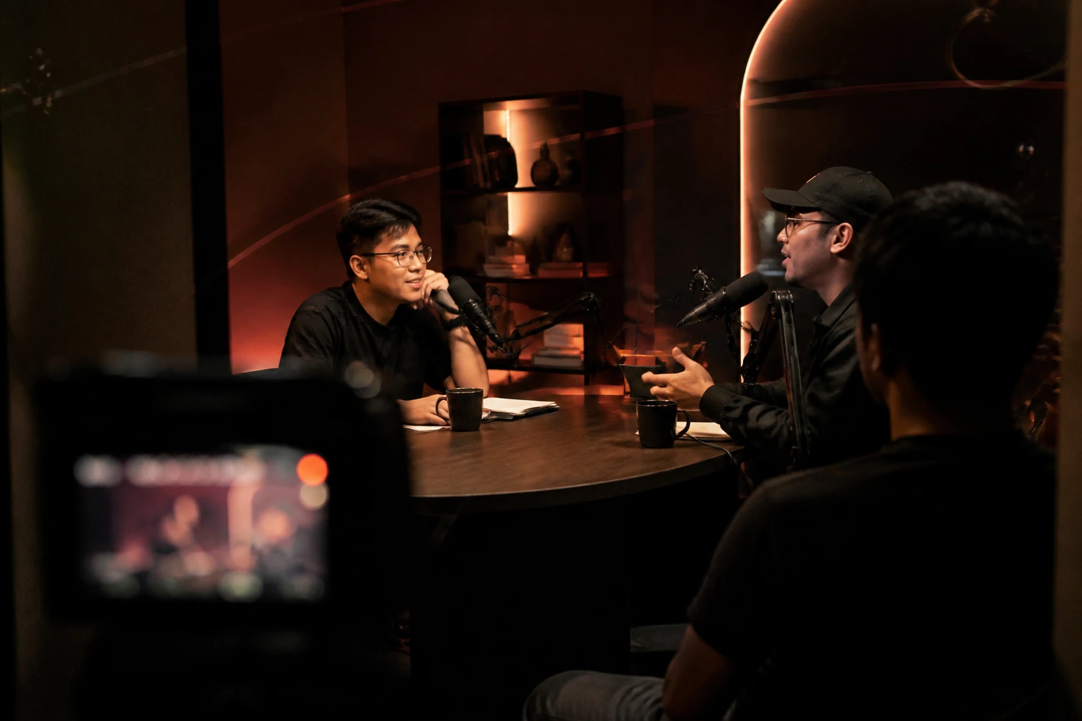 Geomedia Group crew recording a podcast episode in the studio